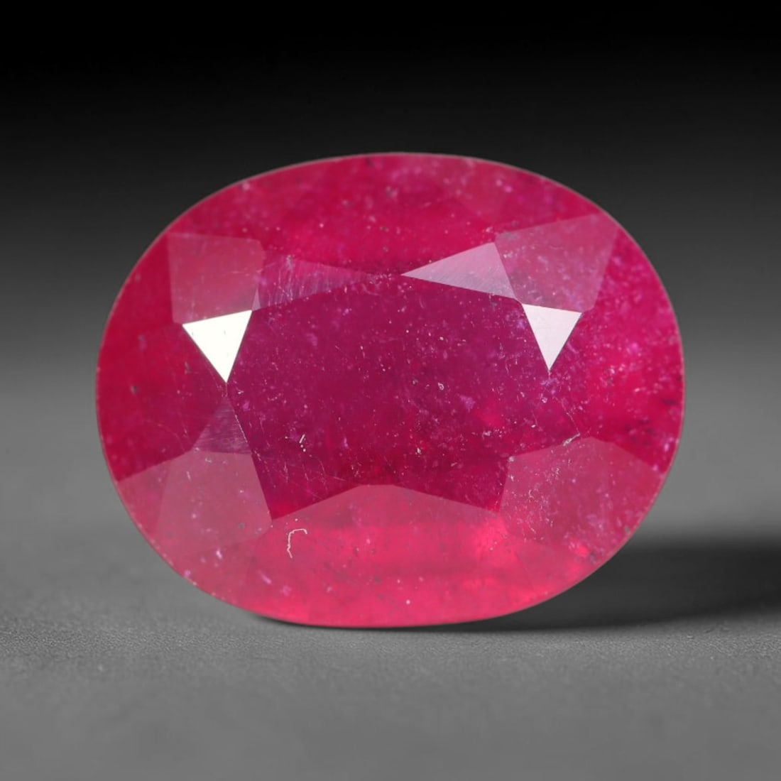 4.78ct Natural Madagascar Vivid Magenta Red Ruby Loose Gemstone, 49BA: This vivid magenta-hued Madagascar ruby boasts rich saturated red-pink saturation scattered with tiny fine mineral specks and distinct two-phase fluid bubble inclusions throughout its translucent crys