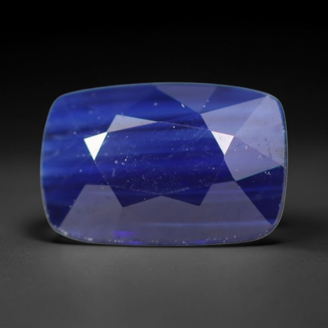1.08ct Natural Ceylon Rich Royal Blue Faceted Blue Sapphire Loose Gemstone, 35BC: This fully polished finished sapphire displays rich saturated royal blue body tone, with fine natural microscopic mineral specks scattered throughout its transparent crystal interior within its 7x4.6x