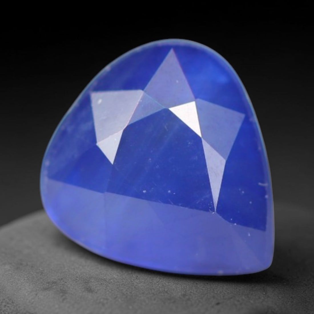 0.95ct Natural Ceylon Rich Royal Blue Faceted Blue Sapphire Loose Gemstone, 48BC: This fully polished finished sapphire displays rich saturated royal blue body tone, with fine natural microscopic mineral specks scattered throughout its transparent crystal interior within its 6x5.5x