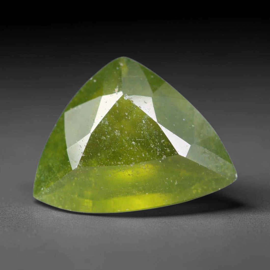 2.50ct Natural Mexican Lime Green Faceted Sphene Loose Gemstone, 57BA: This precisely faceted sphene exhibits vivid translucent lime green body tone, featuring fine natural mineral veils and tiny scattered crystalline micro-inclusions trapped within its high-refractive c