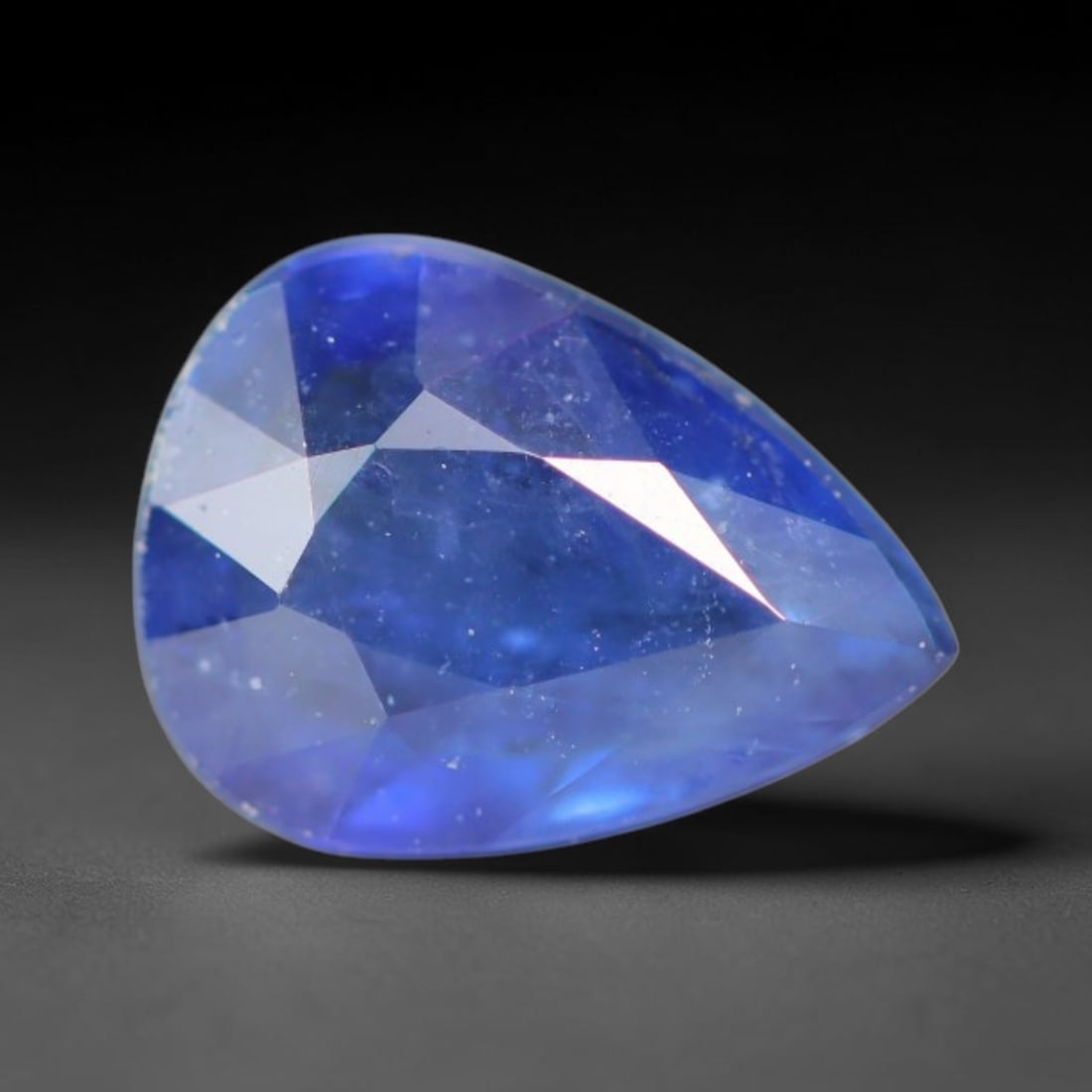 1.00ct Natural Ceylon Rich Royal Blue Faceted Blue Sapphire Loose Gemstone, 49BC: This fully polished finished sapphire displays rich saturated royal blue body tone, with fine natural microscopic mineral specks scattered throughout its transparent crystal interior within its 7x5.2x