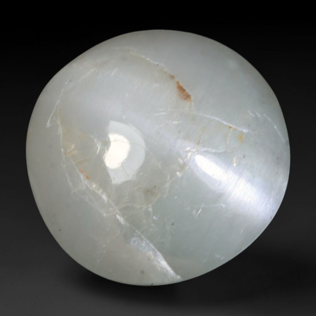 1.52 Carats Natural Ceylon Chrysoberyl Cat's Eye Loose Gemstone, 2AL: This polished Ceylon chrysoberyl cabochon displays a sharp, distinct silvery chatoyant band running across its smooth surface, formed by dense aligned microscopic rutile inclusions inherent to genuine