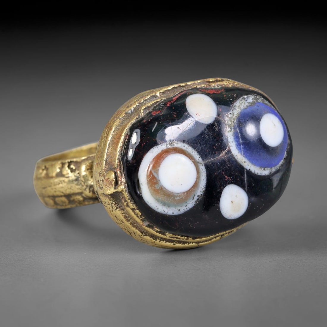 Antique Islamic Millefiori Evil Eye Glass Cabochon Set Vintage Signet Ring (1700-1900 CE), 58AN: The primary collectible value resides within the inset antique millefiori evil-eye glass cabochon, authentic genuine antique glass (distinguished from earlier ancient glass and modern vintage glass) c