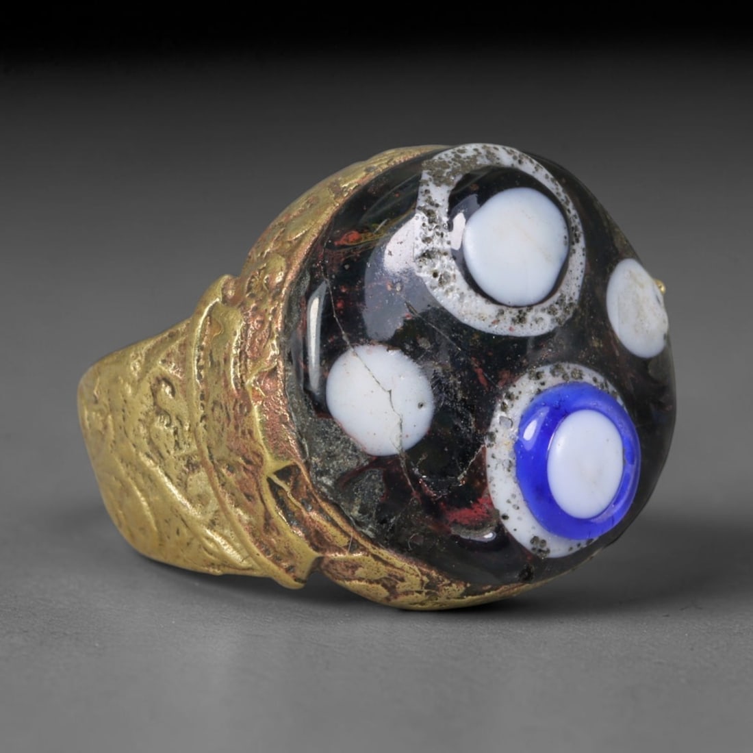 Antique Islamic Millefiori Evil Eye Glass Cabochon Set Vintage Signet Ring (1700-1900 CE), 67AM: The primary collectible value resides within the inset antique millefiori evil-eye glass cabochon, authentic genuine antique glass (distinguished from earlier ancient glass and modern vintage glass) c