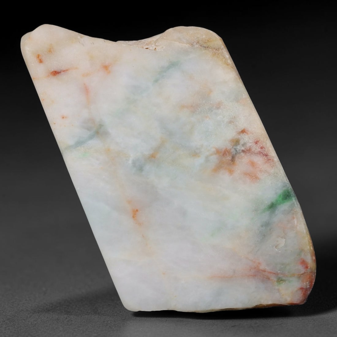 252ct Natural Type A Burmese Jadeite Jade Sliced Rough, 29FB: This specimen is a sliced rough block of natural Type A Burmese jadeite jade. The interior displays natural colour zoning with visible mineral veining and crystalline patterns typical of unprocessed j