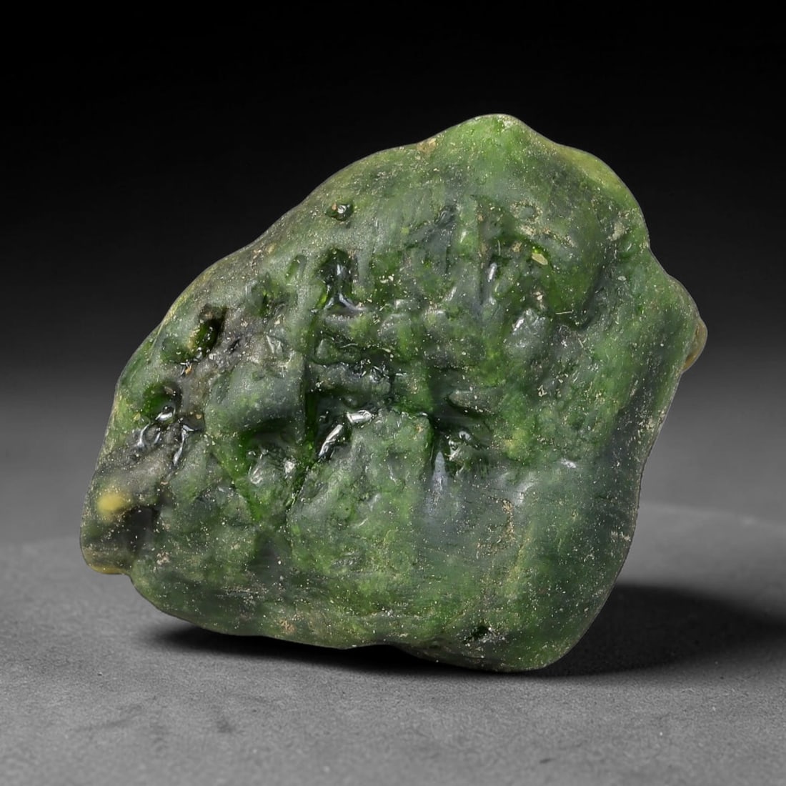 113ct Natural Russian Siberian Deep Forest Green Chrome Diopside Rough, 92AH: This substantial uncut chrome diopside rough features rich saturated forest green color boosted by natural chromium deposits, creating vivid emerald-hued translucency across its textured raw surface, 