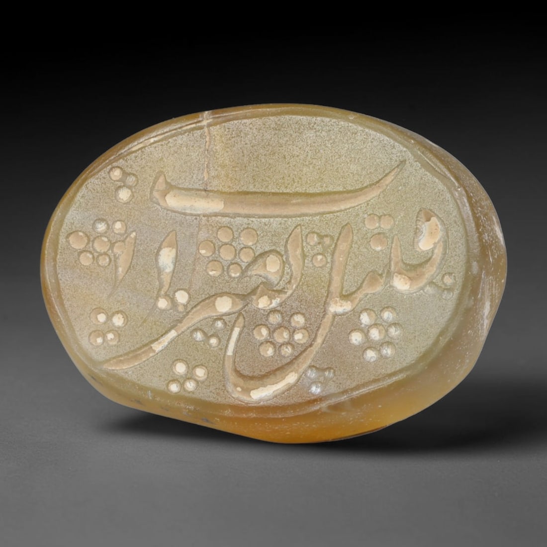 Antique Islamic Qajar / Late Ottoman Agate Calligraphic Talisman Seal (1700-1900 CE), 81FP: Genuine fully hand-carved oval agate seal, entirely crafted by hand without machine tooling, identifiable by organic, uneven hand-cut engraving texture throughout the calligraphic field. The stone bea