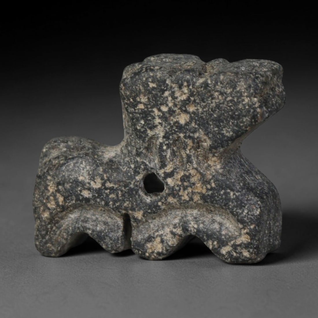 Ancient Bactrian Hand Carved Schist Stone Protective Amulet, 92AP: Miniature antique wearable talisman hand hewn from natural speckled schist metamorphic stone, originating from ancient Bactrian Central Asian cultural sphere. Schist was a prominent carving material i