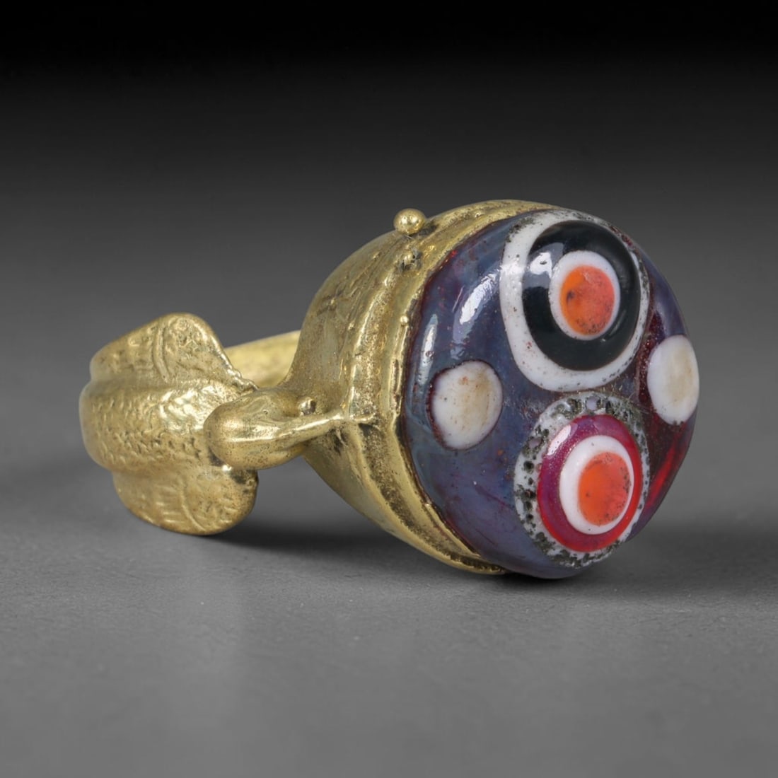 Antique Islamic Millefiori Evil Eye Glass Cabochon Set Vintage Signet Ring (1700-1900 CE), 70AM: The primary collectible value resides within the inset antique millefiori evil-eye glass cabochon, authentic genuine antique glass (distinguished from earlier ancient glass and modern vintage glass) c