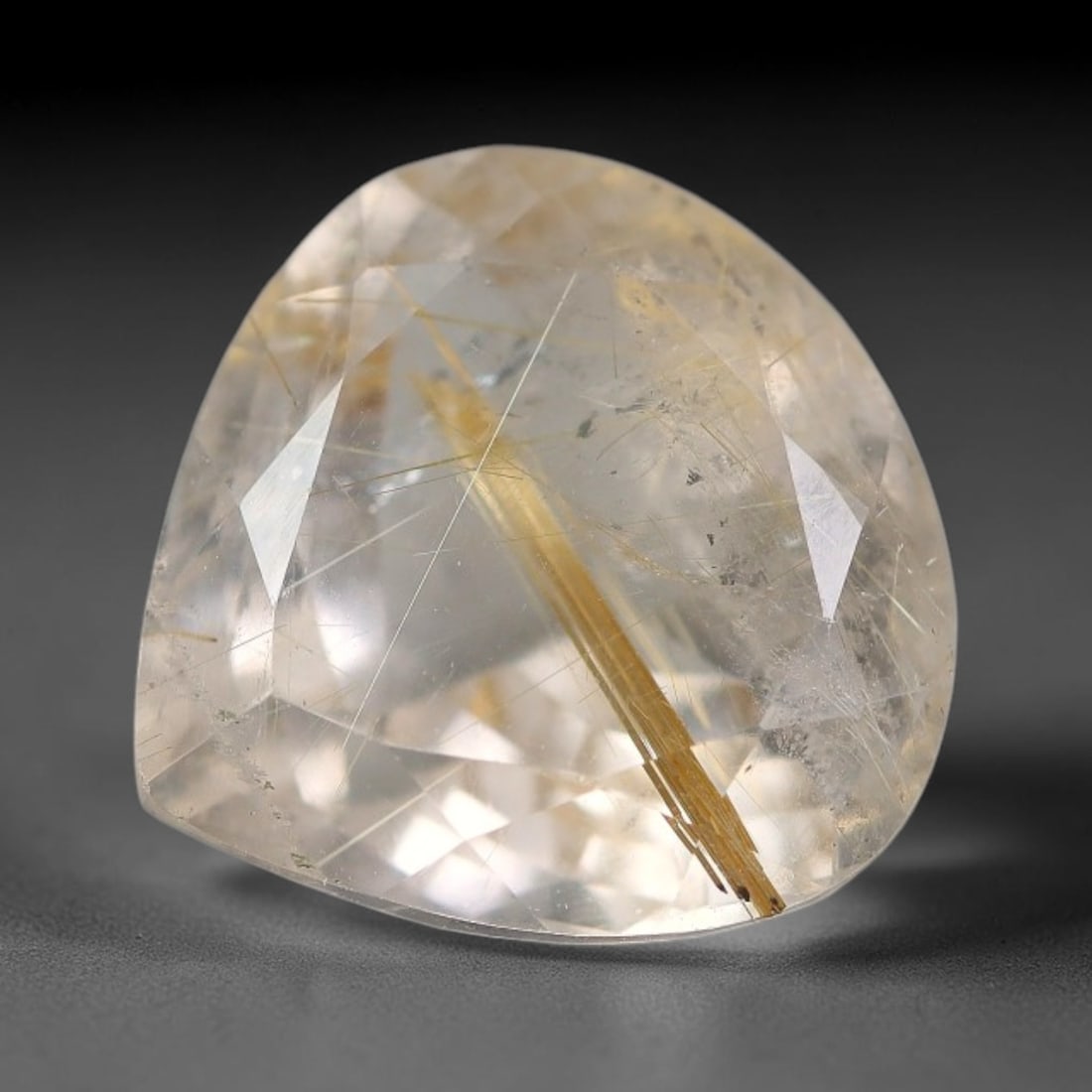 5.27 Carats Natural Brazil Golden Needle Rutile Quartz Loose Gemstone, 98FG: This natural Brazil golden needle rutile quartz facet carries dimension readings of 11.8x11.1x7.4mm, filled with dense thin copper-gold rutile needle inclusions that stretch horizontally across the tr