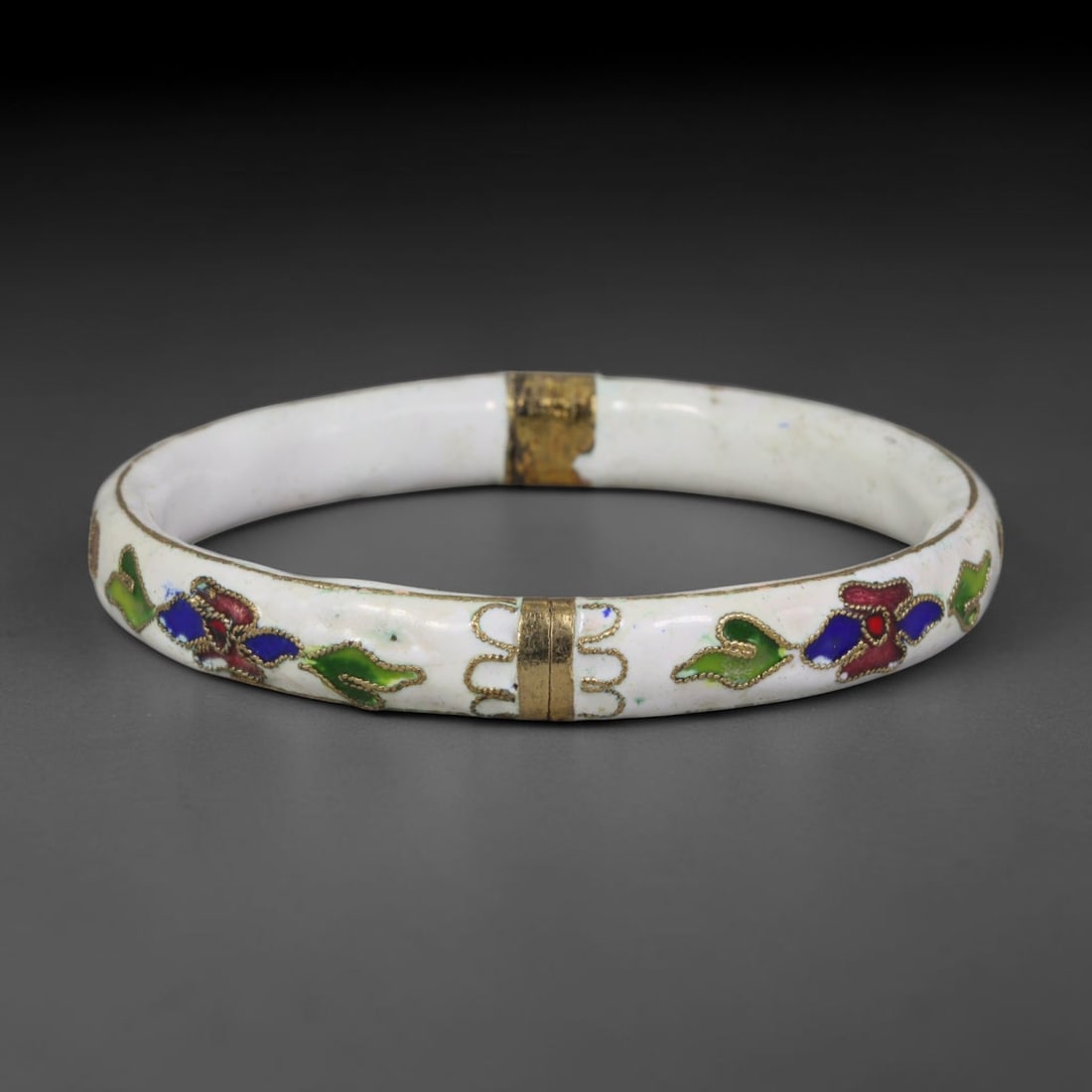 Vintage Chinese Cloisonne Bangle - White Floral Enamel Bracelet, 70FD: Built upon a gilded metal foundation with classic Chinese cloisonne twisted wire filigree craftsmanship, this hinged bangle features an opaque white enamel base adorned with repeating stylized floral 