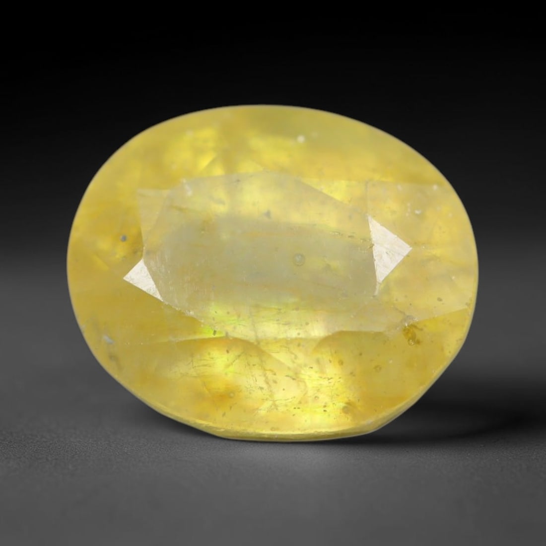 2.47 Carats Natural African Bright Lemon Yellow Sapphire Loose Gemstone, 22AG: This vivid lemon yellow sapphire radiates warm saturated golden hue with crisp faceted light dispersion, measured at 7.9x6.6x4.8mm, fine natural internal needle inclusions add authentic organic charac