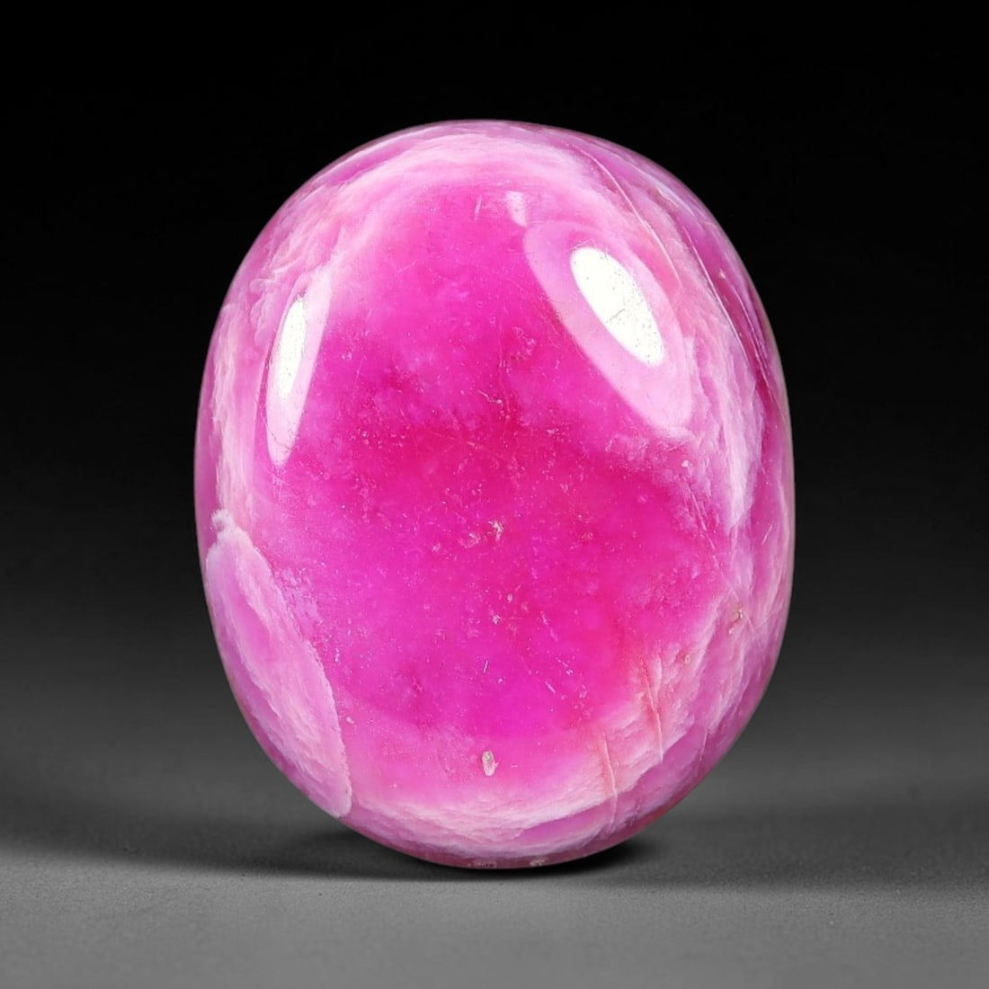 14 Carats Natural Mozambique Vivid Pink Red Ruby Loose Gemstone, 75FG: This polished Mozambique ruby cabochon measures 17x13.8x4.8mm, featuring striking natural swirling white mineral banding layered across a rich saturated pink red base that creates a unique organic art