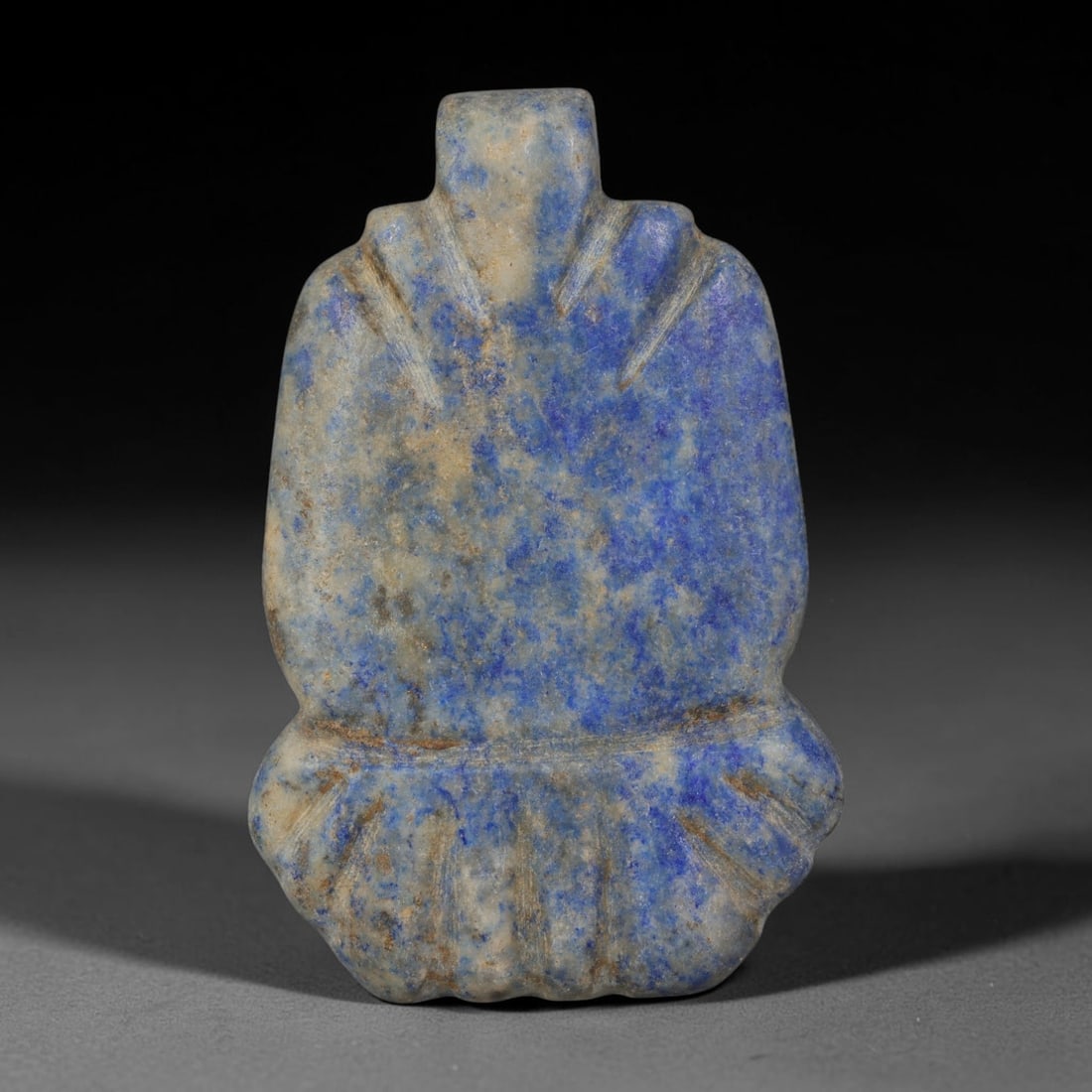 Ancient Sasanian Lapis Lazuli Hand Carved Amulet, 75AP: Antique wearable protective amulet fully carved from solid natural lapis lazuli stone, originating from the historic Sasanian Empire cultural sphere. Lapis lazuli was an immensely valued sacred stone 
