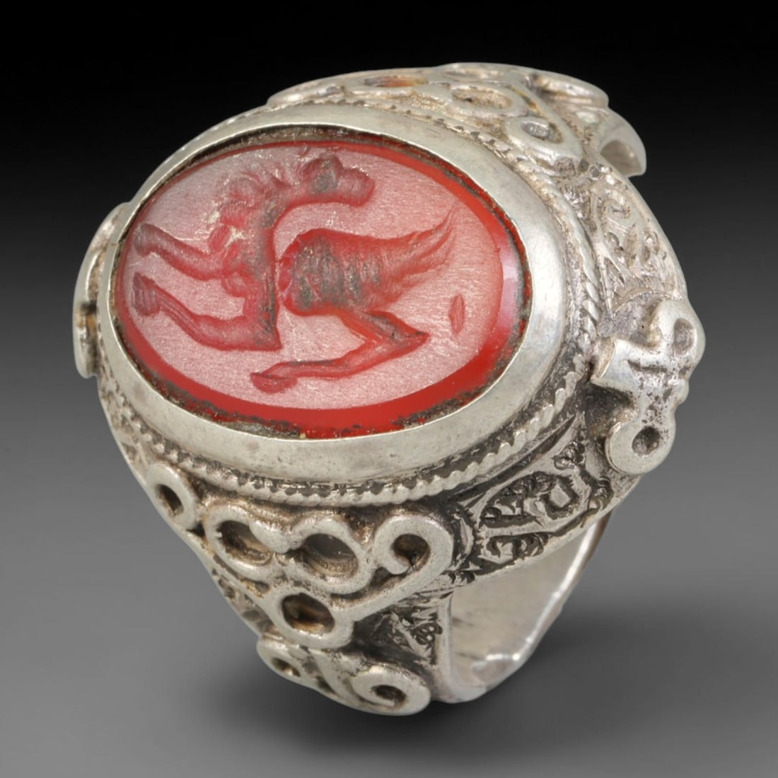 Ancient Medieval Qajar Persian Culture Silver Carnelian Intaglio Signet Ring (1789-1925 CE), 41BF: This authentic antique handcrafted silver signet ring originates from Qajar Dynasty Persian craft traditions, a revered form of elite personal seal jewelry widely traded and worn across historic Persi
