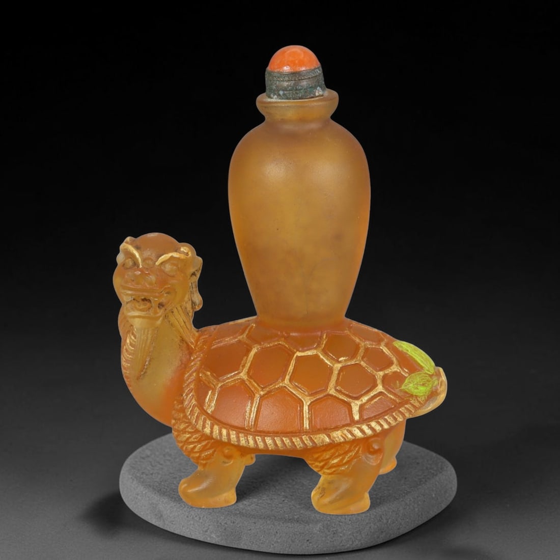 Vintage Chinese Liuli Glass Snuff Bottle - Dragon Tortoise Carrier, 41AS: This snuff bottle is crafted from frosted amber liuli glass, with the main vessel seated atop a carved dragon tortoise base. The tortoise shell is detailed with gilded hexagonal scale patterns and fac