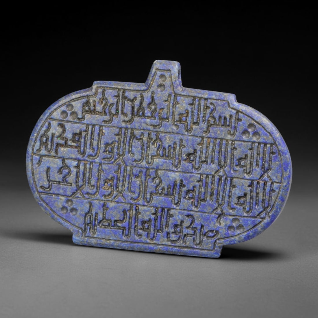 Ancient Medieval Mughal Islamic Lapis Lazuli Calligraphic Talisman Plaque (1526-1857 CE), 18BL: This antique carved lapis lazuli talisman plaque originates from Mughal artistic traditions of the Indian subcontinent, treasured mineral amulets crafted for devotional use, spiritual protection and n
