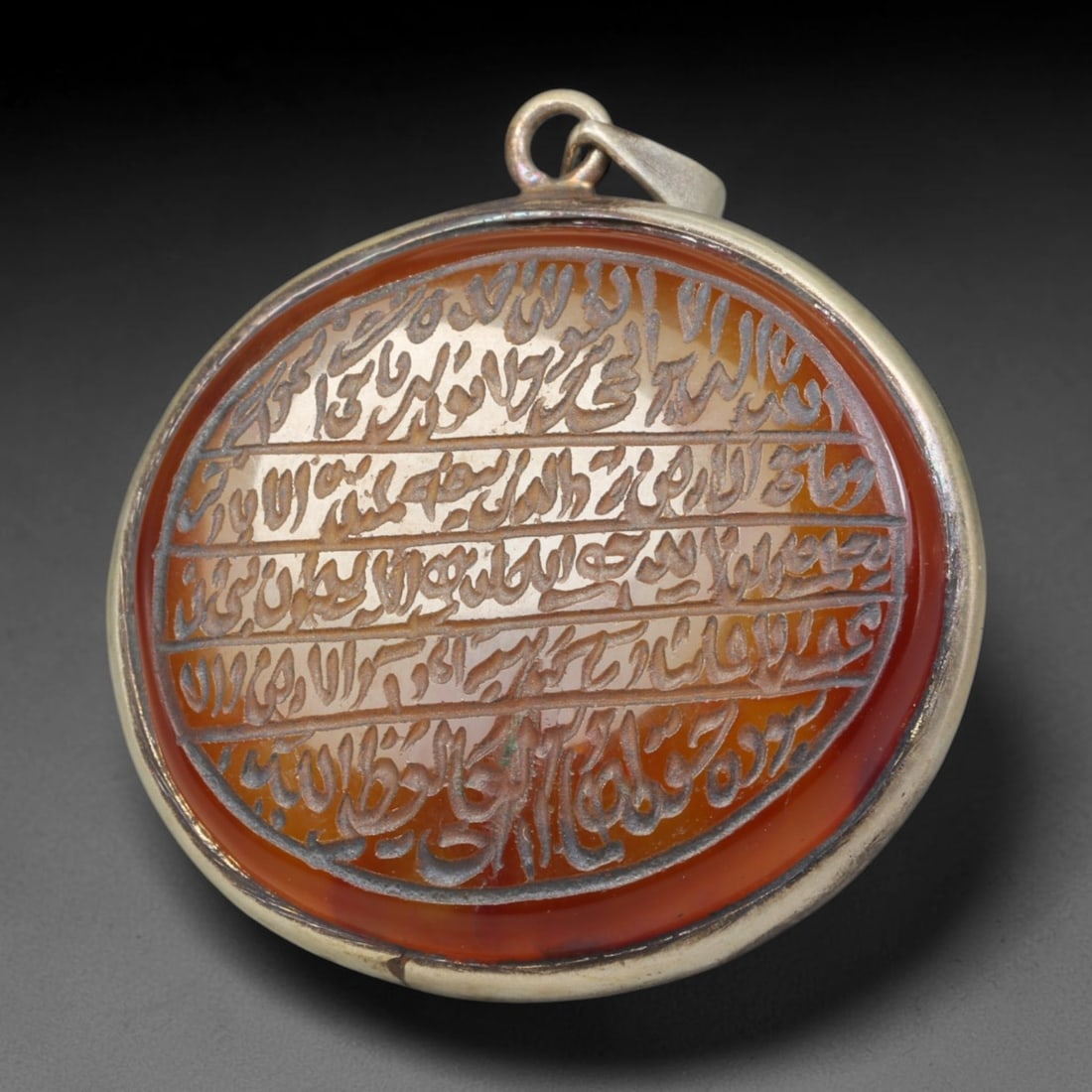 Ancient Medieval Mughal Islamic Carnelian Agate Calligraphic Talisman Pendant (1526-1857 CE), 61BL: This antique carved carnelian agate talisman originates from Mughal Islamic craft traditions, highly sought sacred chalcedony amulets crafted for spiritual protection and noble personal adornment acro