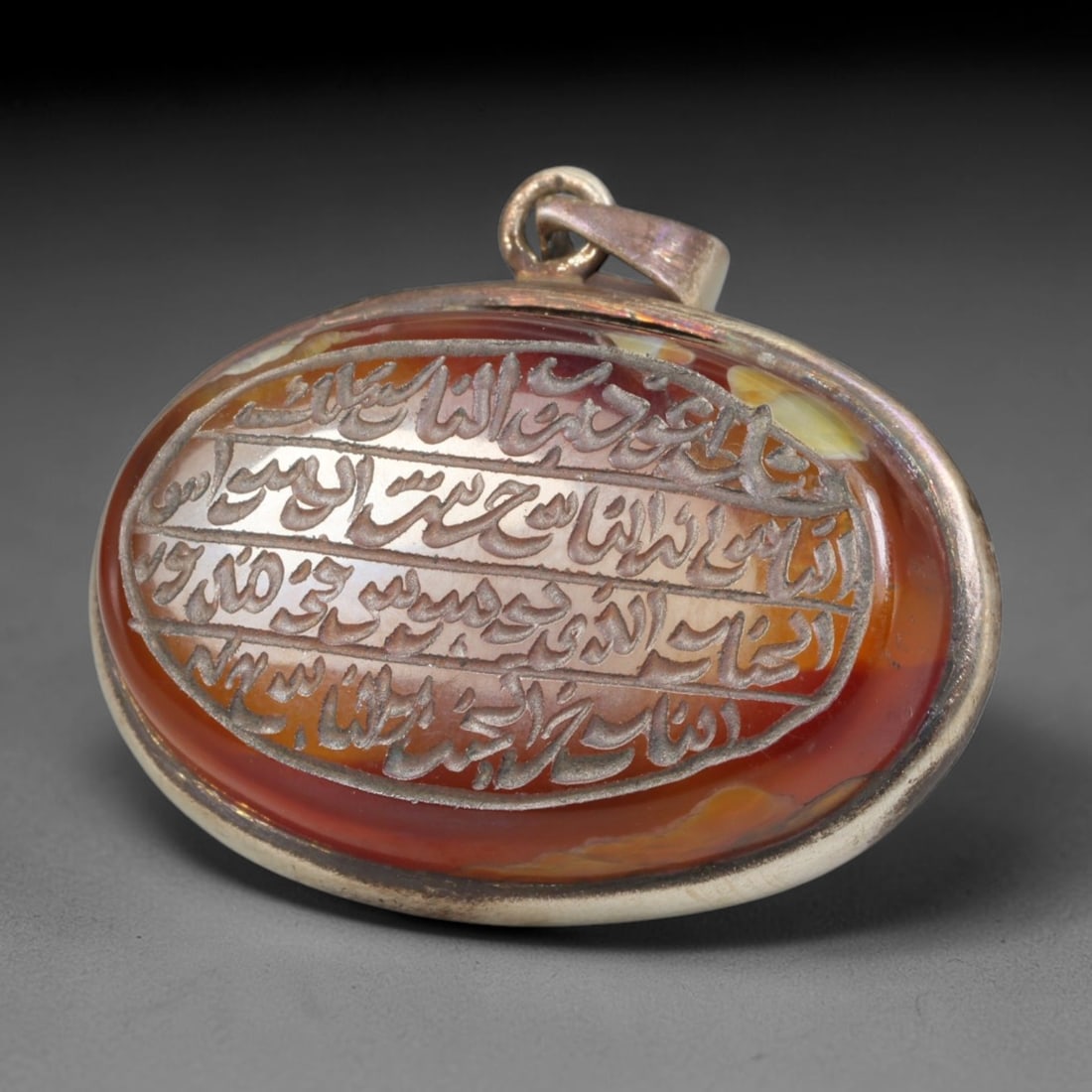 Ancient Medieval Mughal Islamic Carnelian Agate Calligraphic Talisman Pendant (1526-1857 CE), 64BL: This antique carved carnelian agate talisman originates from Mughal Islamic craft traditions, highly sought sacred chalcedony amulets crafted for spiritual protection and noble personal adornment acro