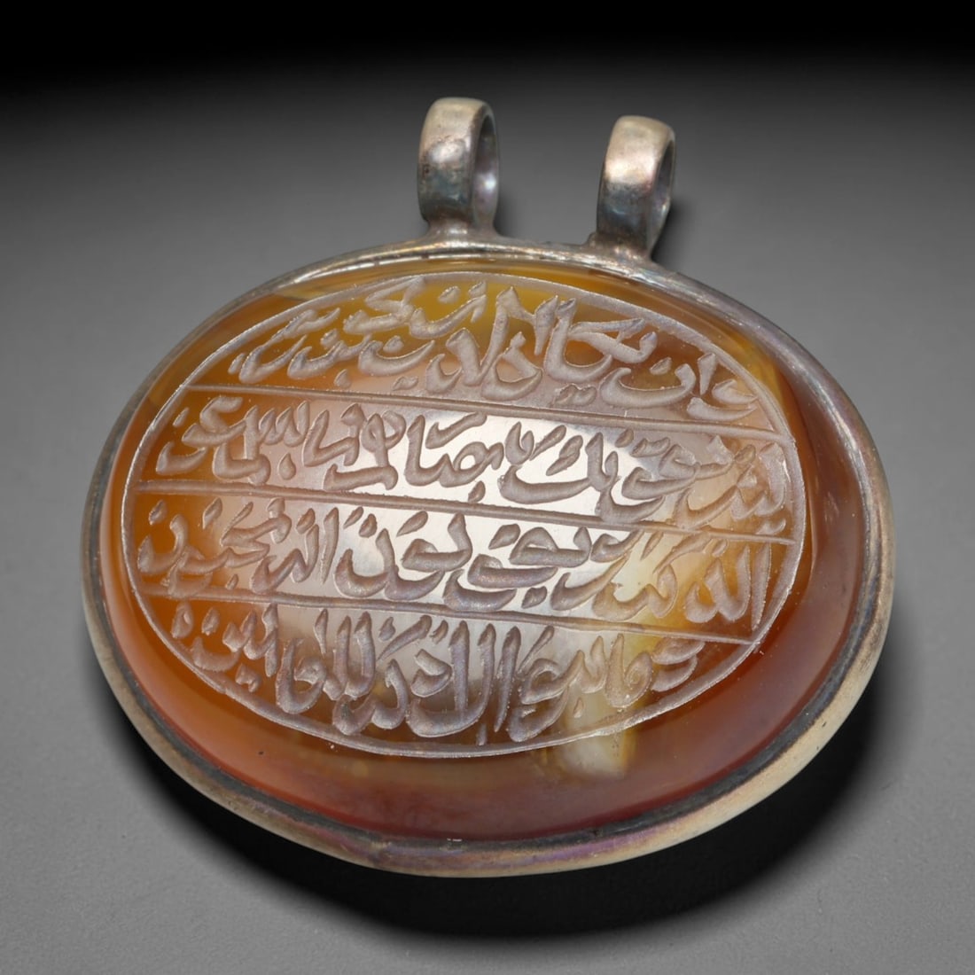 Ancient Medieval Mughal Islamic Carnelian Agate Calligraphic Talisman Pendant (1526-1857 CE), 37BL: This antique carved carnelian agate talisman originates from Mughal Islamic craft traditions, highly sought sacred chalcedony amulets crafted for spiritual protection and noble personal adornment acro