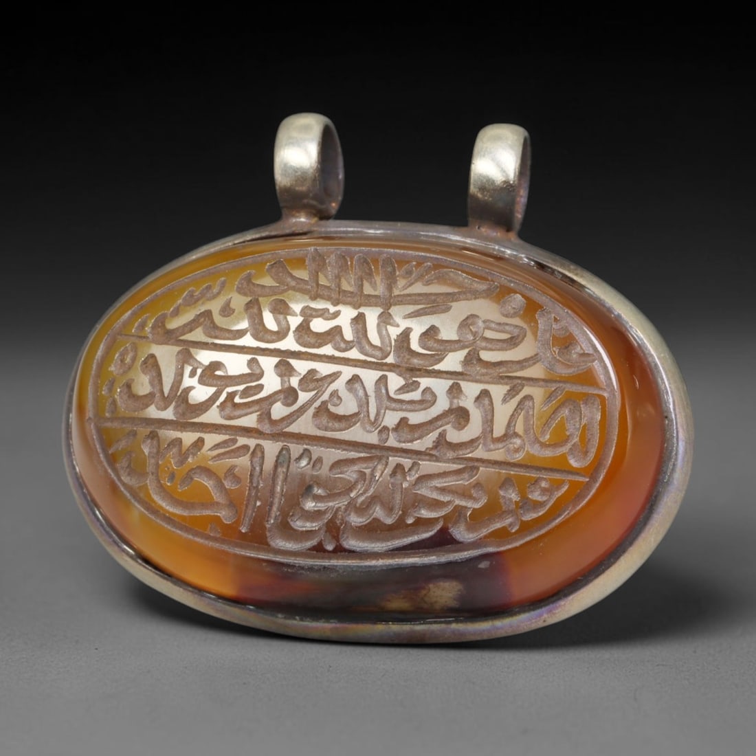 Ancient Medieval Mughal Islamic Carnelian Agate Calligraphic Talisman Pendant (1526-1857 CE), 29BL: This antique carved carnelian agate talisman originates from Mughal Islamic craft traditions, highly sought sacred chalcedony amulets crafted for spiritual protection and noble personal adornment acro