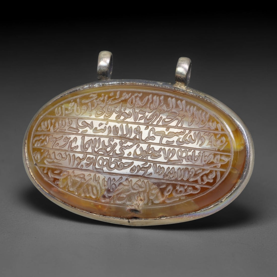 Ancient Medieval Mughal Islamic Carnelian Agate Calligraphic Talisman Pendant (1526-1857 CE), 45BL: This antique carved carnelian agate talisman originates from Mughal Islamic craft traditions, highly sought sacred chalcedony amulets crafted for spiritual protection and noble personal adornment acro