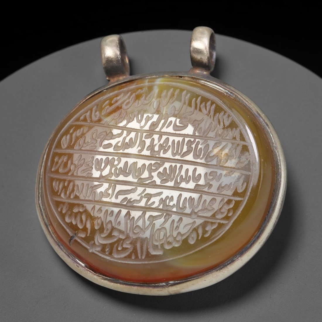 Ancient Medieval Mughal Islamic Carnelian Agate Calligraphic Talisman Pendant (1526-1857 CE), 56BL: This antique carved carnelian agate talisman originates from Mughal Islamic craft traditions, highly sought sacred chalcedony amulets crafted for spiritual protection and noble personal adornment acro