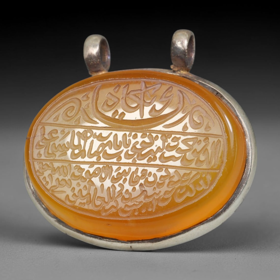 Ancient Medieval Mughal Islamic Carnelian Agate Calligraphic Talisman Pendant (1526-1857 CE), 35BL: This antique carved carnelian agate talisman originates from Mughal Islamic craft traditions, highly sought sacred chalcedony amulets crafted for spiritual protection and noble personal adornment acro