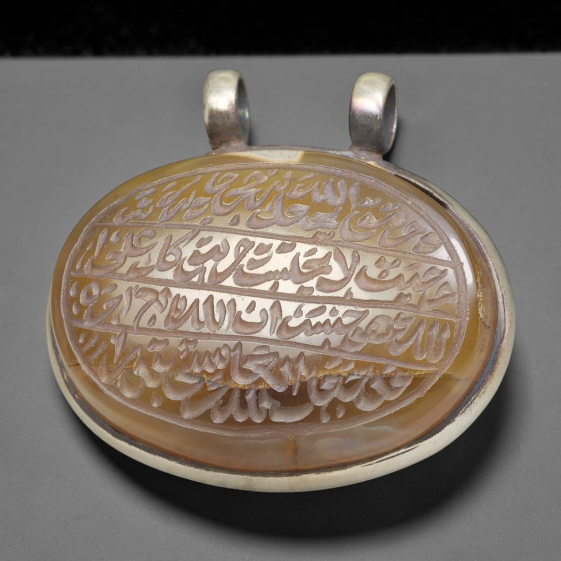 Ancient Medieval Mughal Islamic Carnelian Agate Calligraphic Talisman Pendant (1526-1857 CE), 42BL: This antique carved carnelian agate talisman originates from Mughal Islamic craft traditions, highly sought sacred chalcedony amulets crafted for spiritual protection and noble personal adornment acro