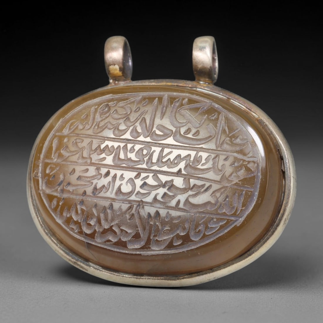 Ancient Medieval Mughal Islamic Carnelian Agate Calligraphic Talisman Pendant (1526-1857 CE), 36BL: This antique carved carnelian agate talisman originates from Mughal Islamic craft traditions, highly sought sacred chalcedony amulets crafted for spiritual protection and noble personal adornment acro