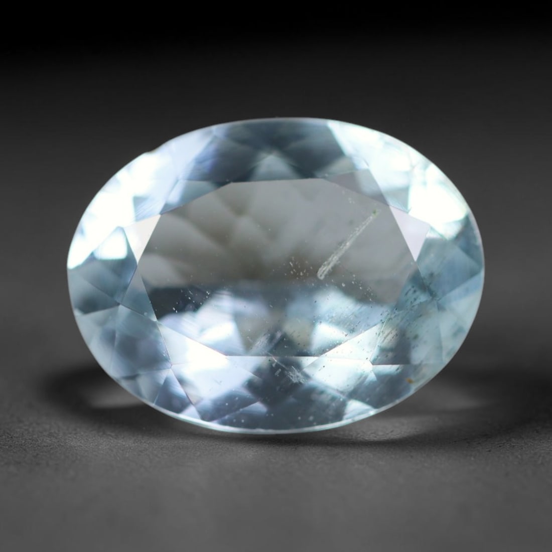 2.90ct Natural Brazilian Sky Blue Faceted Aquamarine Loose Gemstone, 23BC: This precisely faceted aquamarine boasts clear translucent pale sky blue body tone with subtle thin mineral needle and tiny scattered crystalline specks visible within its polished reflective planes i
