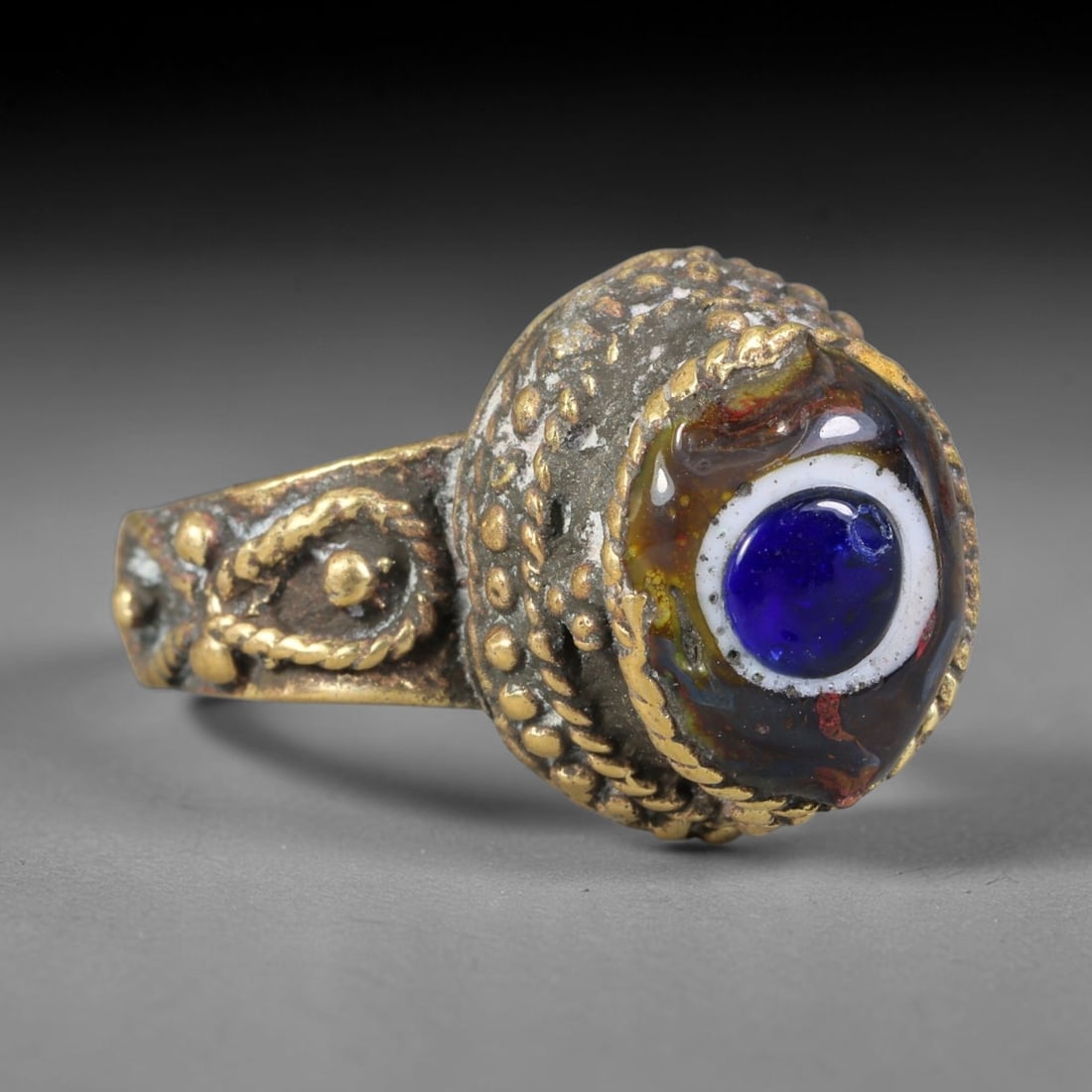 Antique Islamic Millefiori Evil Eye Glass Cabochon Set Vintage Signet Ring (1700-1900 CE), 83AM: The primary collectible value resides within the inset antique millefiori evil-eye glass cabochon, authentic genuine antique glass (distinguished from earlier ancient glass and modern vintage glass) c