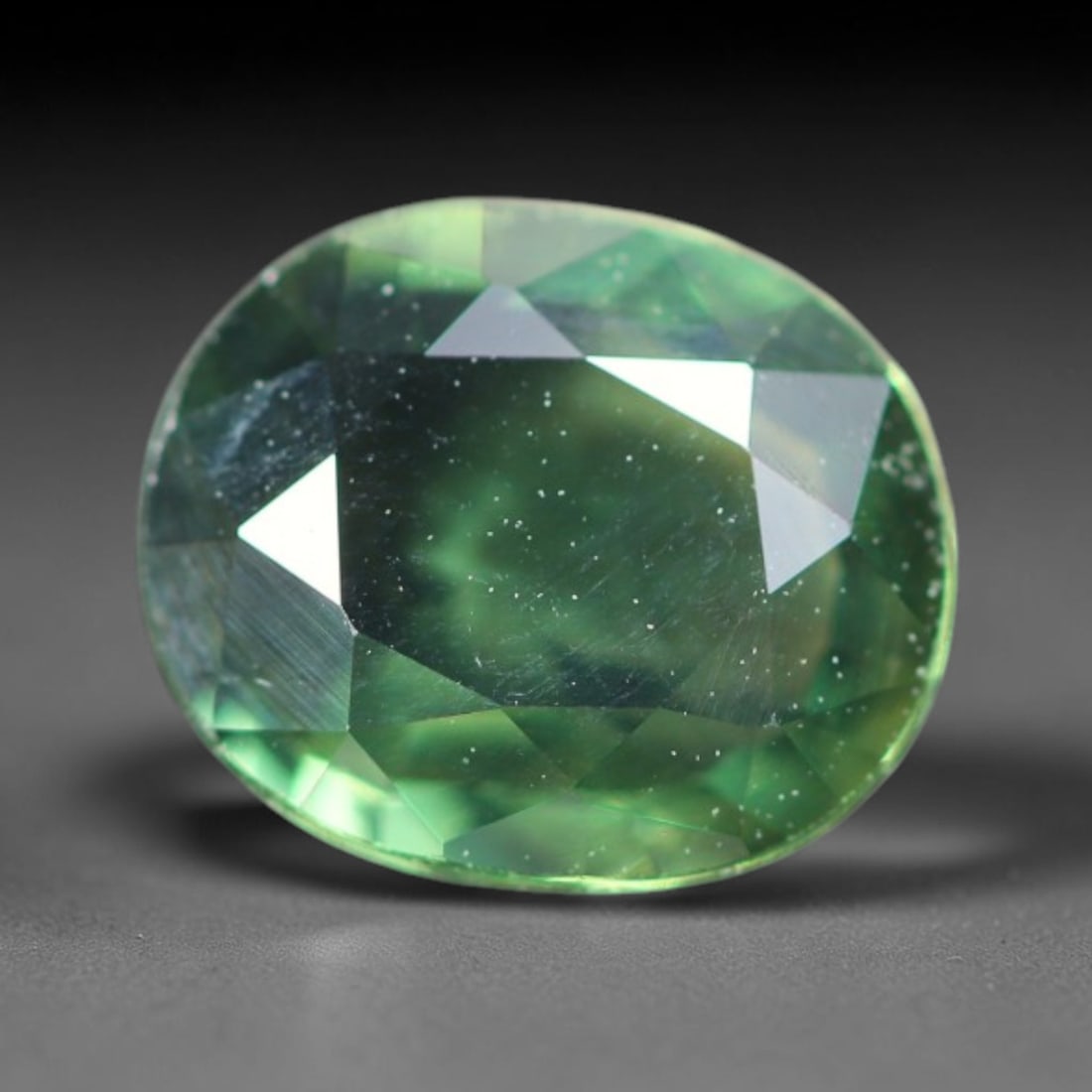 1.01ct Natural Australian Teal Faceted Sapphire Loose Gemstone, 6BA: This skillfully faceted sapphire features rich saturated body tone with fine microscopic mineral inclusions scattered evenly across its polished reflective planes within its 6.8x5.7x2.8mm calibrated d