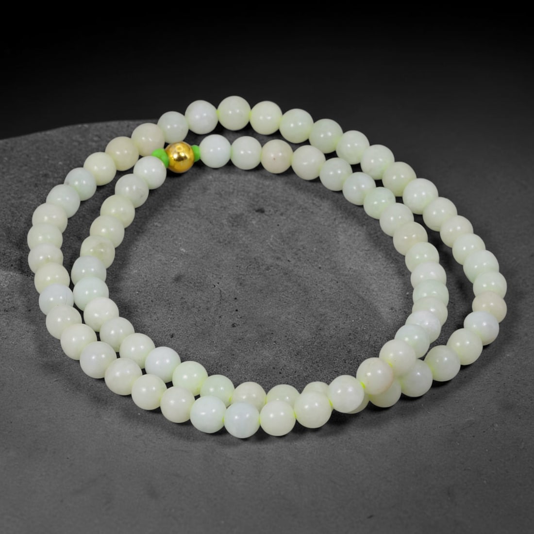 Natural Burmese Type A Jadeite Jade Round Bead Necklace with Gold Gilt Accent Bead, 6BL: Elegant hand-strung necklace made from polished natural untreated Burmese Type A jadeite jade spherical beads, each bead measuring 8 mm in diameter. The jadeite features a soft pale milky celadon hue 
