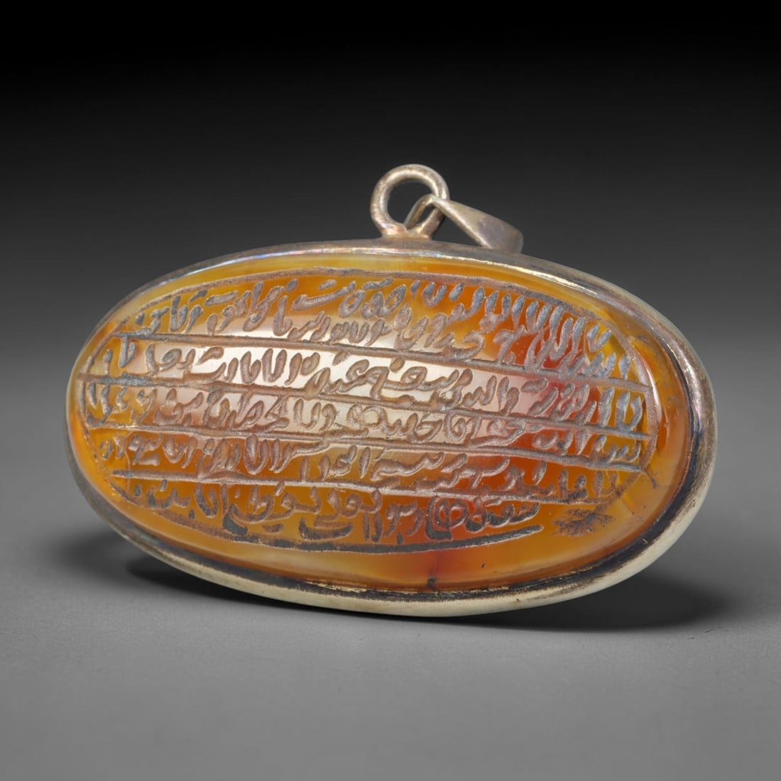 Ancient Medieval Mughal Islamic Carnelian Agate Calligraphic Talisman Pendant (1526-1857 CE), 68BL: This antique carved carnelian agate talisman originates from Mughal Islamic craft traditions, highly sought sacred chalcedony amulets crafted for spiritual protection and noble personal adornment acro