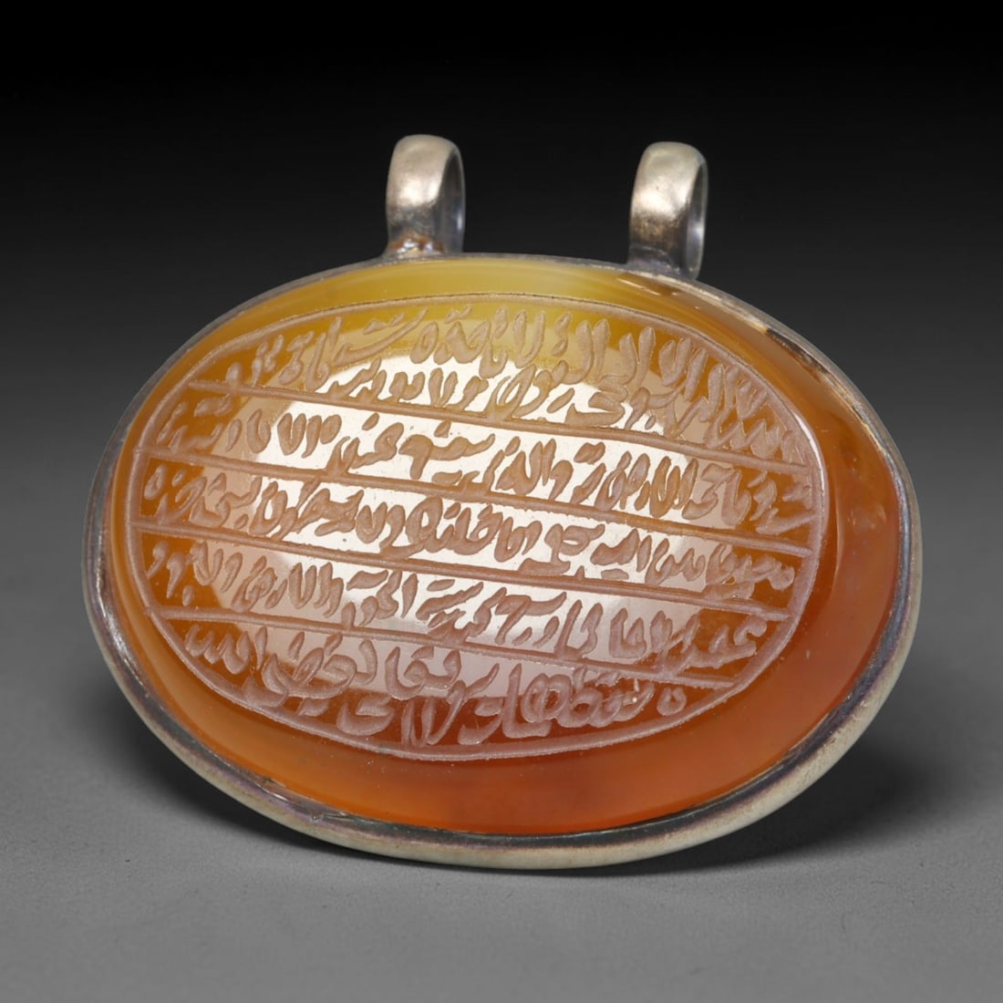Ancient Medieval Mughal Islamic Carnelian Agate Calligraphic Talisman Pendant (1526-1857 CE), 50BL: This antique carved carnelian agate talisman originates from Mughal Islamic craft traditions, highly sought sacred chalcedony amulets crafted for spiritual protection and noble personal adornment acro