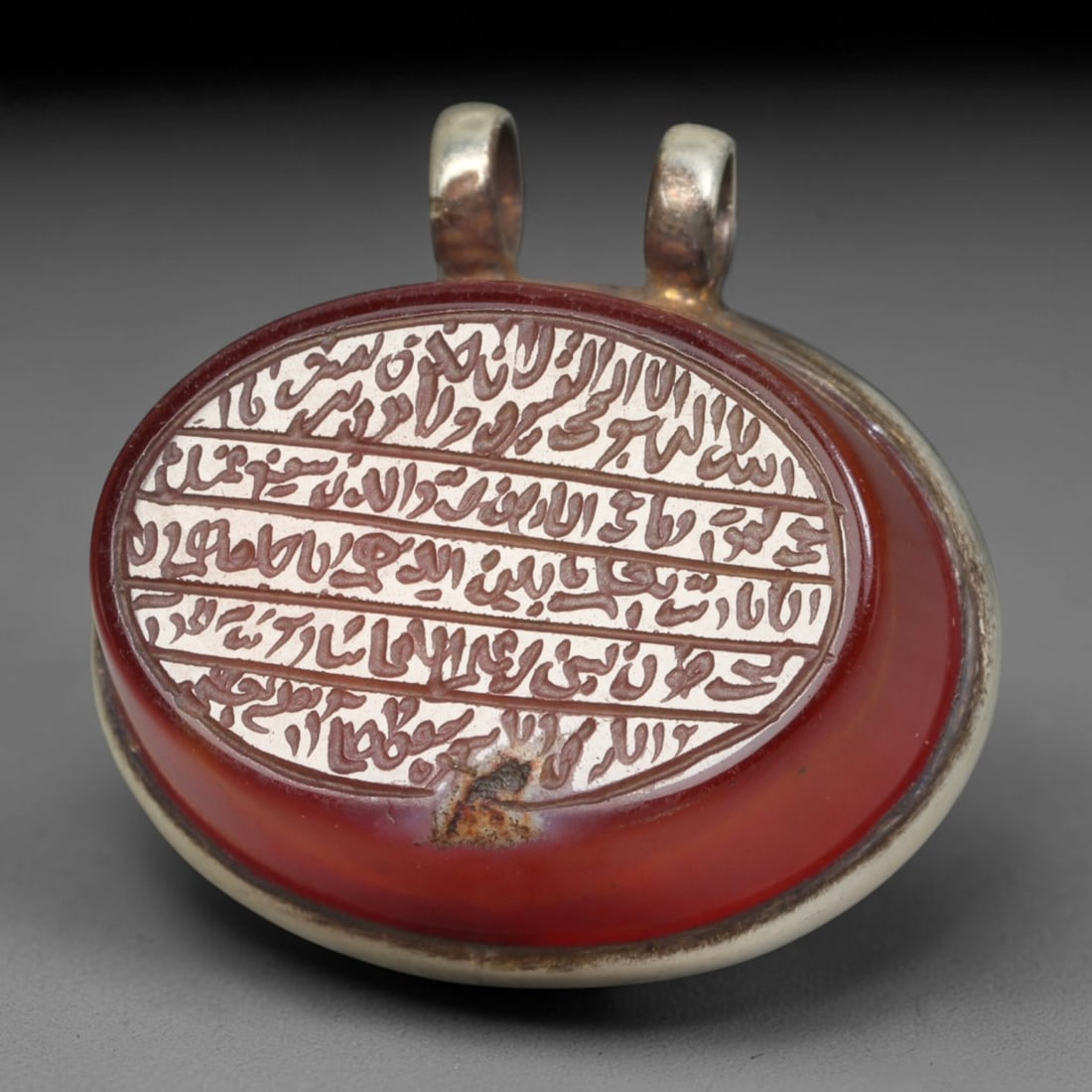 Ancient Medieval Mughal Islamic Carnelian Agate Calligraphic Talisman Pendant (1526-1857 CE), 51BL: This antique carved carnelian agate talisman originates from Mughal Islamic craft traditions, highly sought sacred chalcedony amulets crafted for spiritual protection and noble personal adornment acro