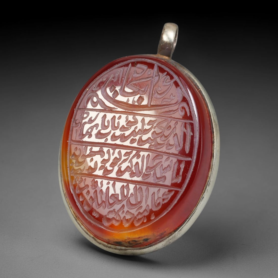 Ancient Medieval Mughal Islamic Carnelian Agate Calligraphic Talisman Pendant (1526-1857 CE), 23BL: This antique carved carnelian agate talisman originates from Mughal Islamic craft traditions, highly sought sacred chalcedony amulets crafted for spiritual protection and noble personal adornment acro