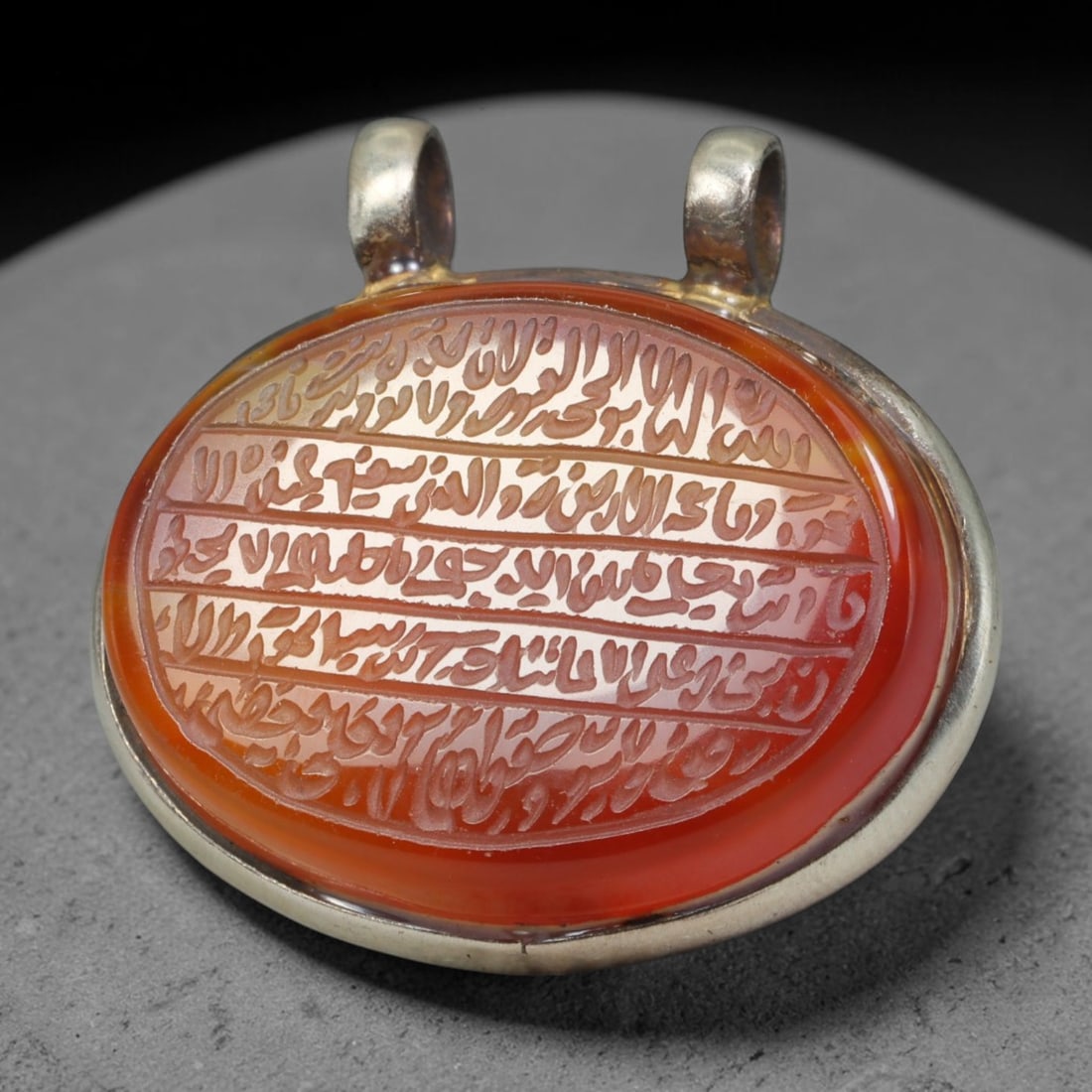 Ancient Medieval Mughal Islamic Carnelian Agate Calligraphic Talisman Pendant (1526-1857 CE), 24BL: This antique carved carnelian agate talisman originates from Mughal Islamic craft traditions, highly sought sacred chalcedony amulets crafted for spiritual protection and noble personal adornment acro