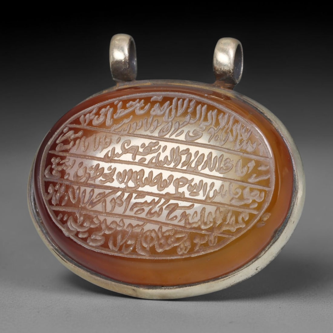 Ancient Medieval Mughal Islamic Carnelian Agate Calligraphic Talisman Pendant (1526-1857 CE), 43BL: This antique carved carnelian agate talisman originates from Mughal Islamic craft traditions, highly sought sacred chalcedony amulets crafted for spiritual protection and noble personal adornment acro