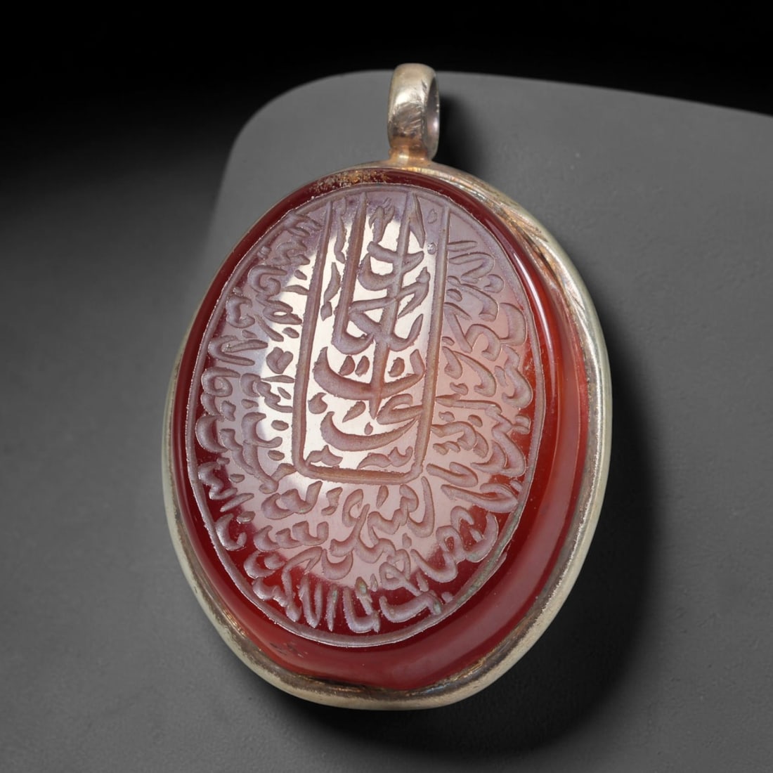 Ancient Medieval Mughal Islamic Carnelian Agate Calligraphic Talisman Pendant (1526-1857 CE), 44BL: This antique carved carnelian agate talisman originates from Mughal Islamic craft traditions, highly sought sacred chalcedony amulets crafted for spiritual protection and noble personal adornment acro