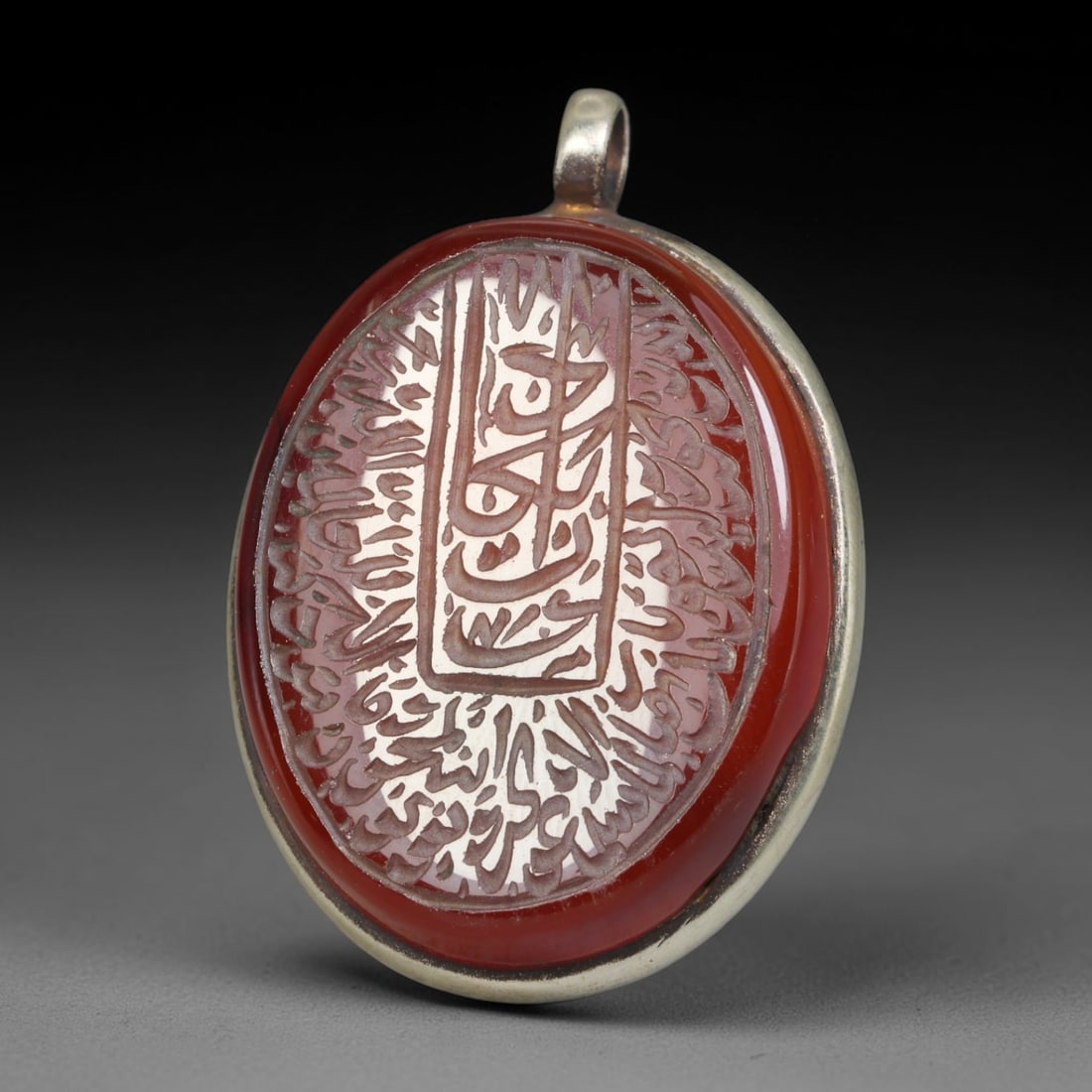 Ancient Medieval Mughal Islamic Carnelian Agate Calligraphic Talisman Pendant (1526-1857 CE), 39BL: This antique carved carnelian agate talisman originates from Mughal Islamic craft traditions, highly sought sacred chalcedony amulets crafted for spiritual protection and noble personal adornment acro