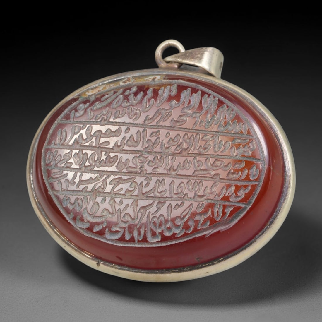 Ancient Medieval Mughal Islamic Carnelian Agate Calligraphic Talisman Pendant (1526-1857 CE), 60BL: This antique carved carnelian agate talisman originates from Mughal Islamic craft traditions, highly sought sacred chalcedony amulets crafted for spiritual protection and noble personal adornment acro