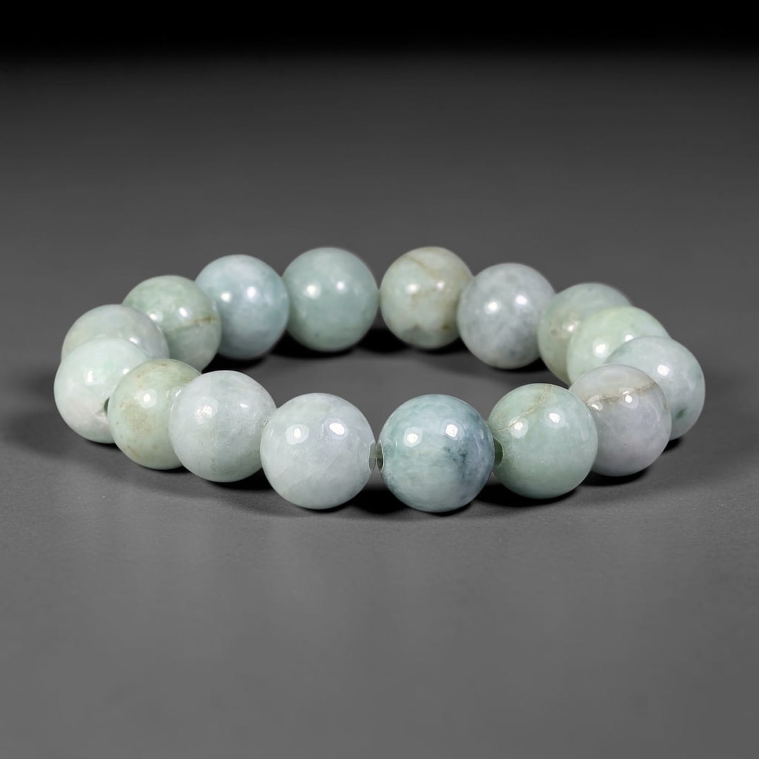 Natural Burmese Type A Jadeite Jade Beaded Bracelet, 21mm Beads, 53BK: Hand-strung bracelet crafted from polished untreated Burmese Type A jadeite jade beads. Every bead features smooth refined polishing with clean centered drill holes for sturdy flexible stringing. Auth