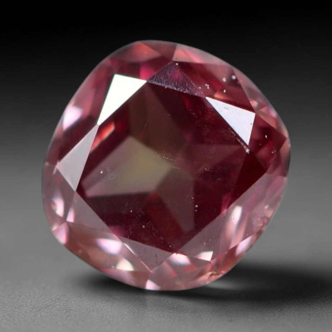0.22ct Natural Fancy Pinkish Purple Diamond Loose Gemstone, 16BG: This polished natural diamond displays rich pinkish-purple body saturation, with subtle fine microscopic mineral specks distributed within its crystal interior, measured at calibrated dimensions of 3.