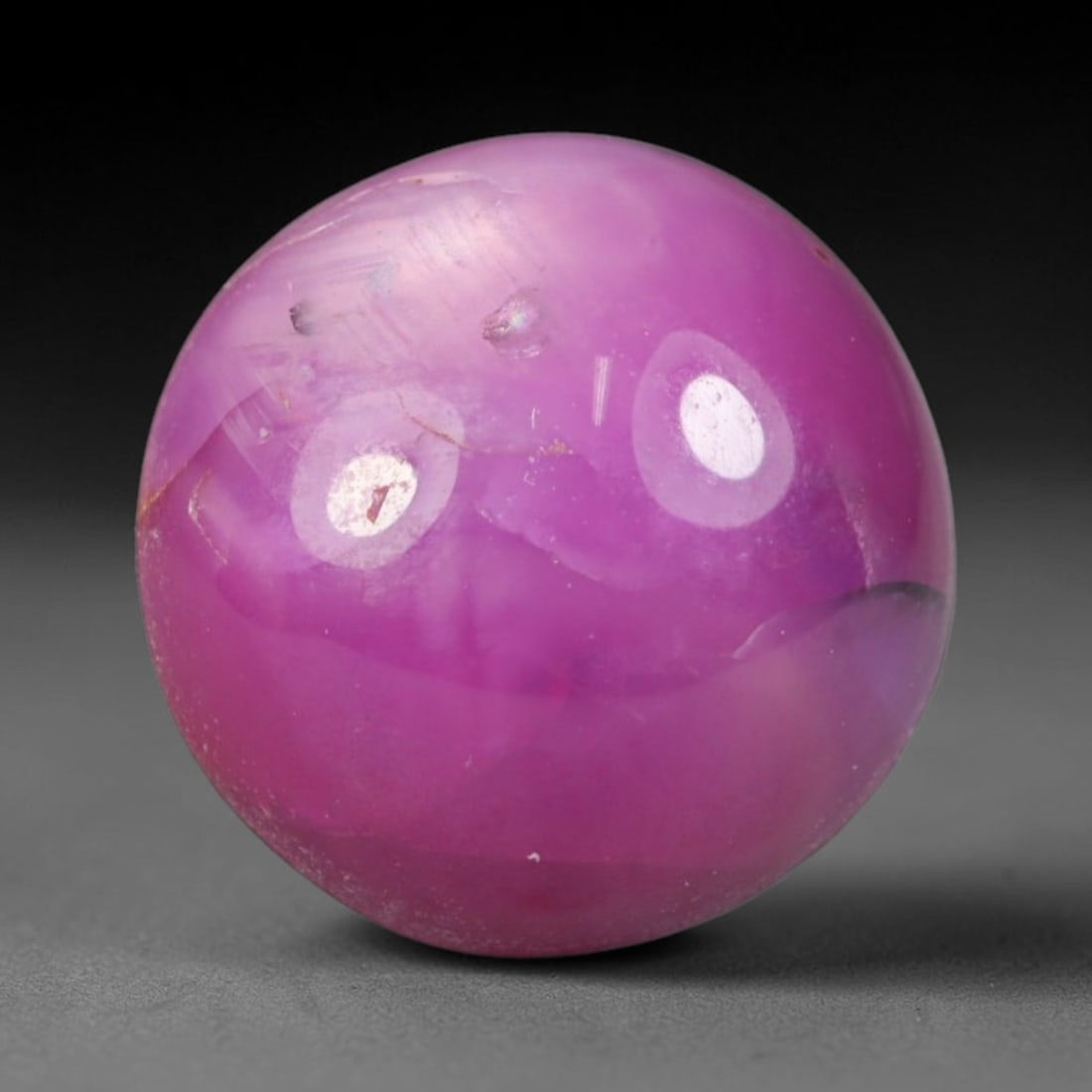 3.50ct Natural Mozambican Deep Crimson Red Ruby Cabochon Loose Gemstone, 15AS, 15AS: This smoothly polished cabochon ruby holds a rich deep crimson red body hue, covered with fine natural surface fracturing and tiny scattered mineral specks across its domed polished surface within its