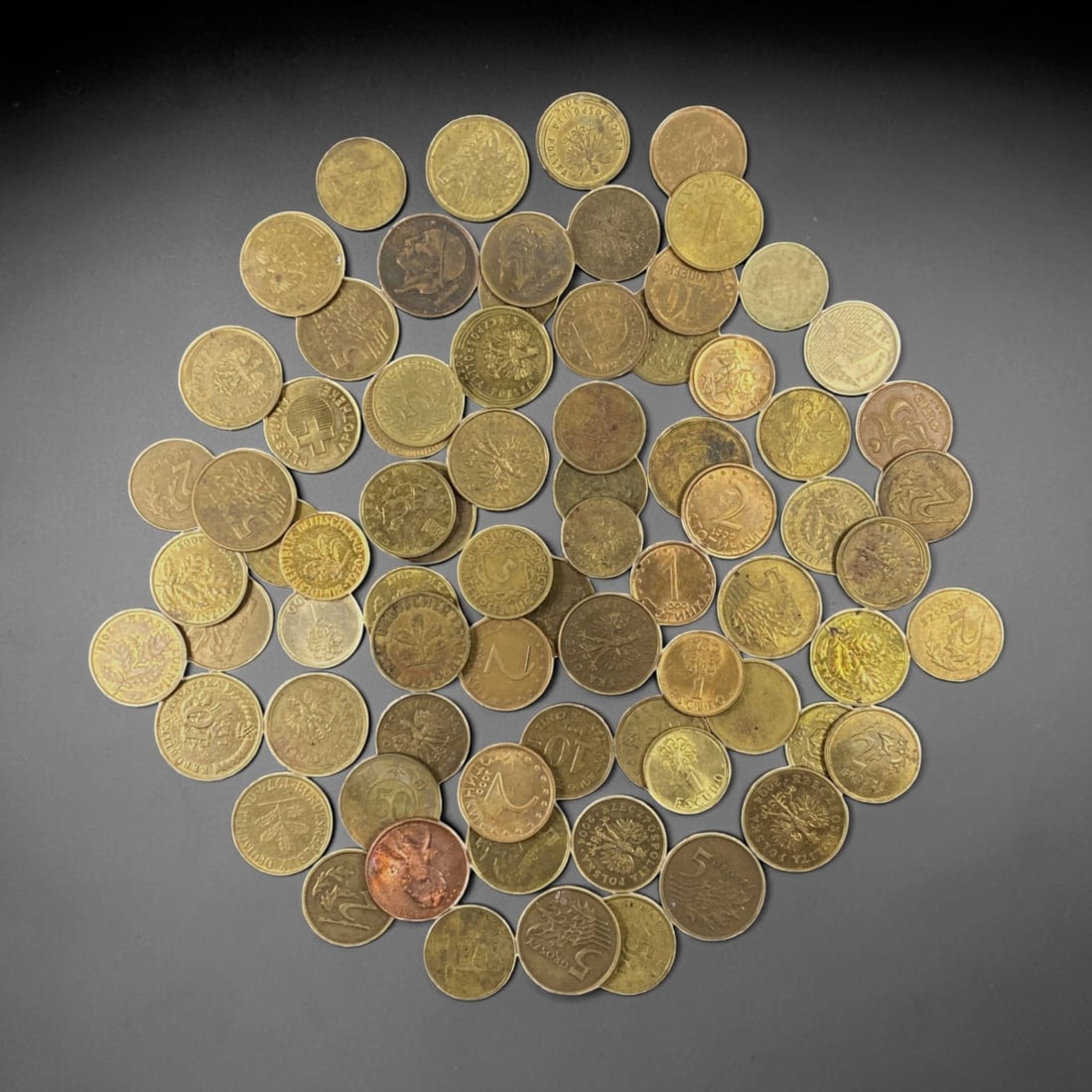 CENTRAL EUROPE: Mixed Brass Coin Bulk Lot, 3V, 3V: This diverse collection of Central European brass coins spans multiple nations and denominations, capturing the everyday currency of the late 20th century. Featuring heraldic motifs, national emblems,