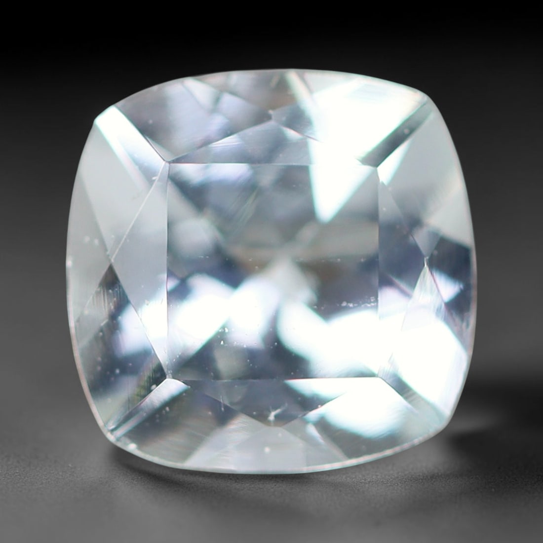 1.26ct Natural Brazilian Sky Blue Faceted Aquamarine Loose Gemstone, 79BF, 79BF: This precisely faceted aquamarine boasts clear translucent pale sky blue body tone with subtle thin mineral needle and tiny scattered crystalline specks visible within its polished reflective planes i