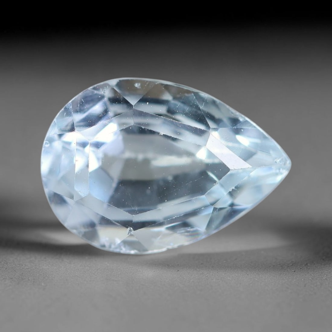 3.10ct Natural Brazilian Sky Blue Topaz Loose Gemstone, 56BE, 56BE: This fully polished topaz exhibits clean bright sky-blue body tone, with faint microscopic natural crystal features visible inside its transparent structure, measured at calibrated dimensions of 11x7.