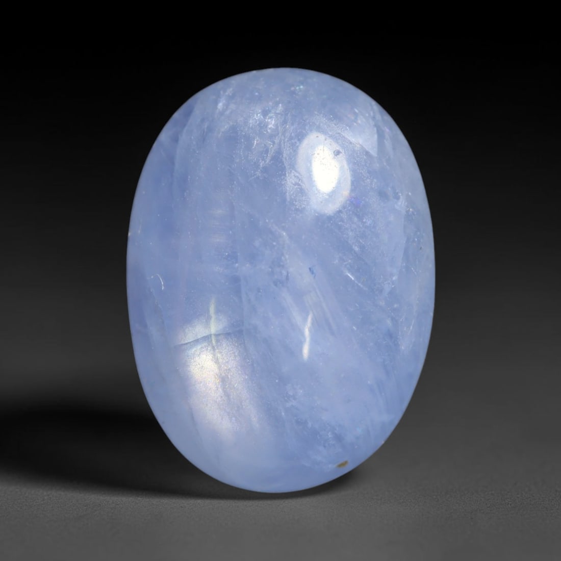 3.96ct Natural Unheated Burmese Blue Star Sapphire Oval Cabochon Loose Gemstone, 57BQ: This smoothly polished oval cabochon features natural Burmese blue star sapphire, formed with densely aligned rutile needle inclusions required to produce asterism. The gently domed surface is expertl